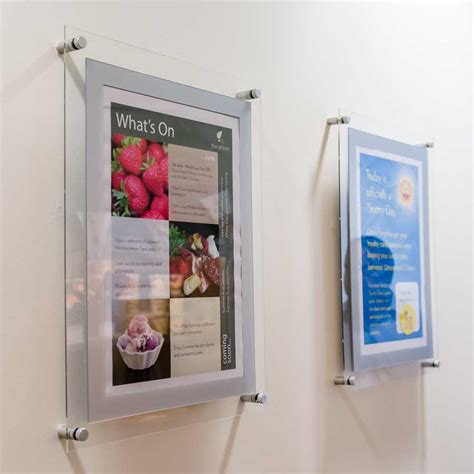 wall mounted acrylic poster holders.